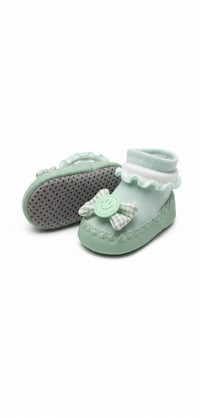 Green and off-white Baby socks shoes