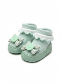 Green and off-white Baby socks shoes