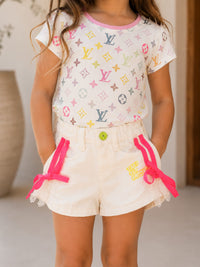 Girls' Playful Off-White Shorts with Hot Pink Bows