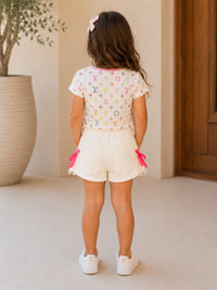 Girls' Playful Off-White Shorts with Hot Pink Bows