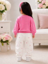 Girls' Heart Patch Pullover Sweatshirt with Ribbon Accents.