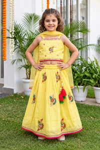 Girls' Bright Yellow Floral Embroidered Mirror-Work Ethnic Lehenga Choli Set.