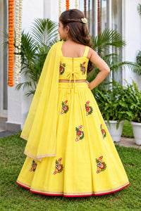 Girls' Bright Yellow Floral Embroidered Mirror-Work Ethnic Lehenga Choli Set.