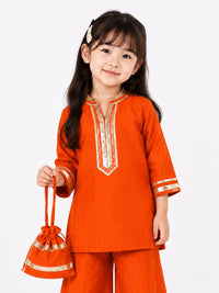 Vibrant Rust-Orange Ethnic Kurta & Bottom Set with Matching Potli.